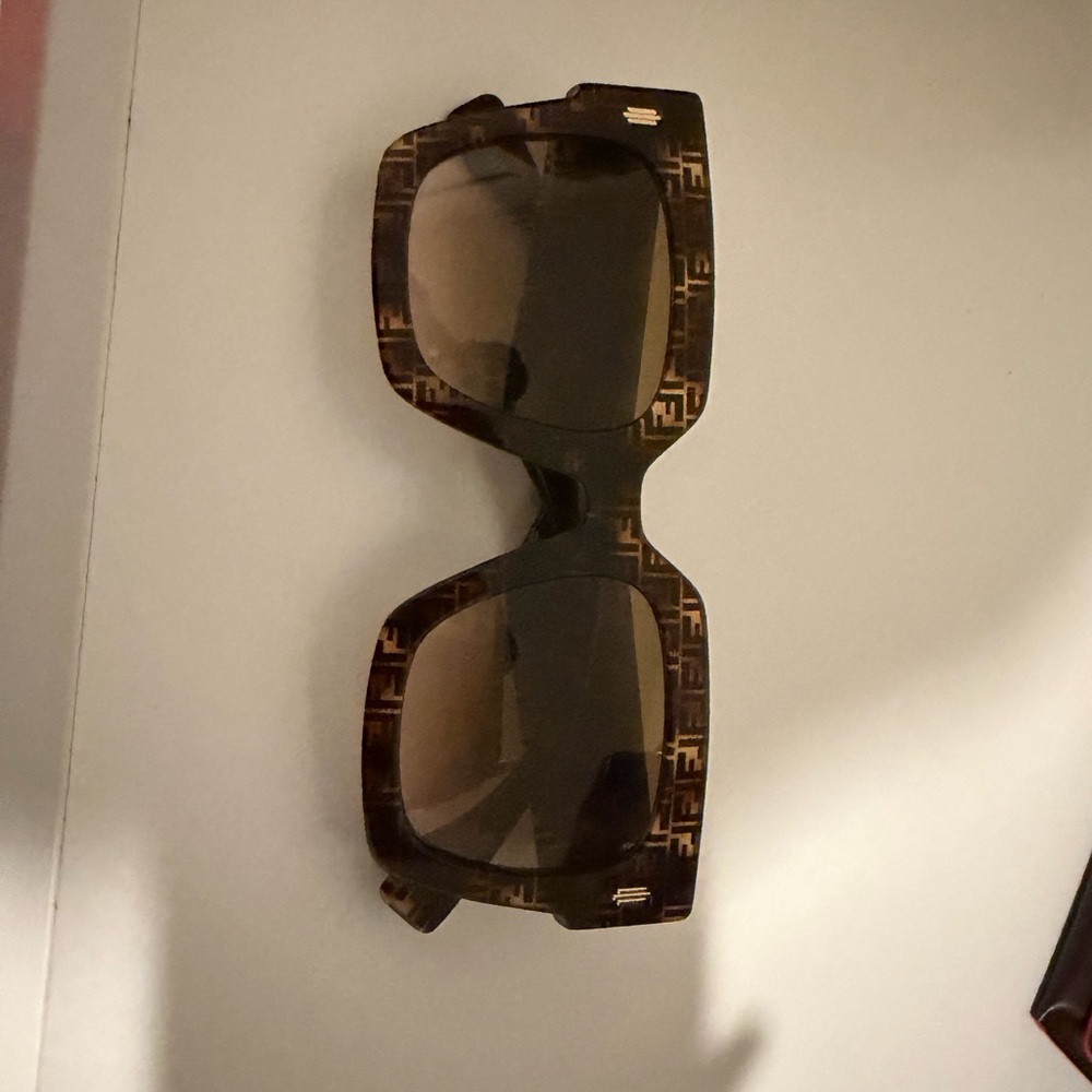 Fendi Brown Sunglasses for women. Tiny scratch on the lens.